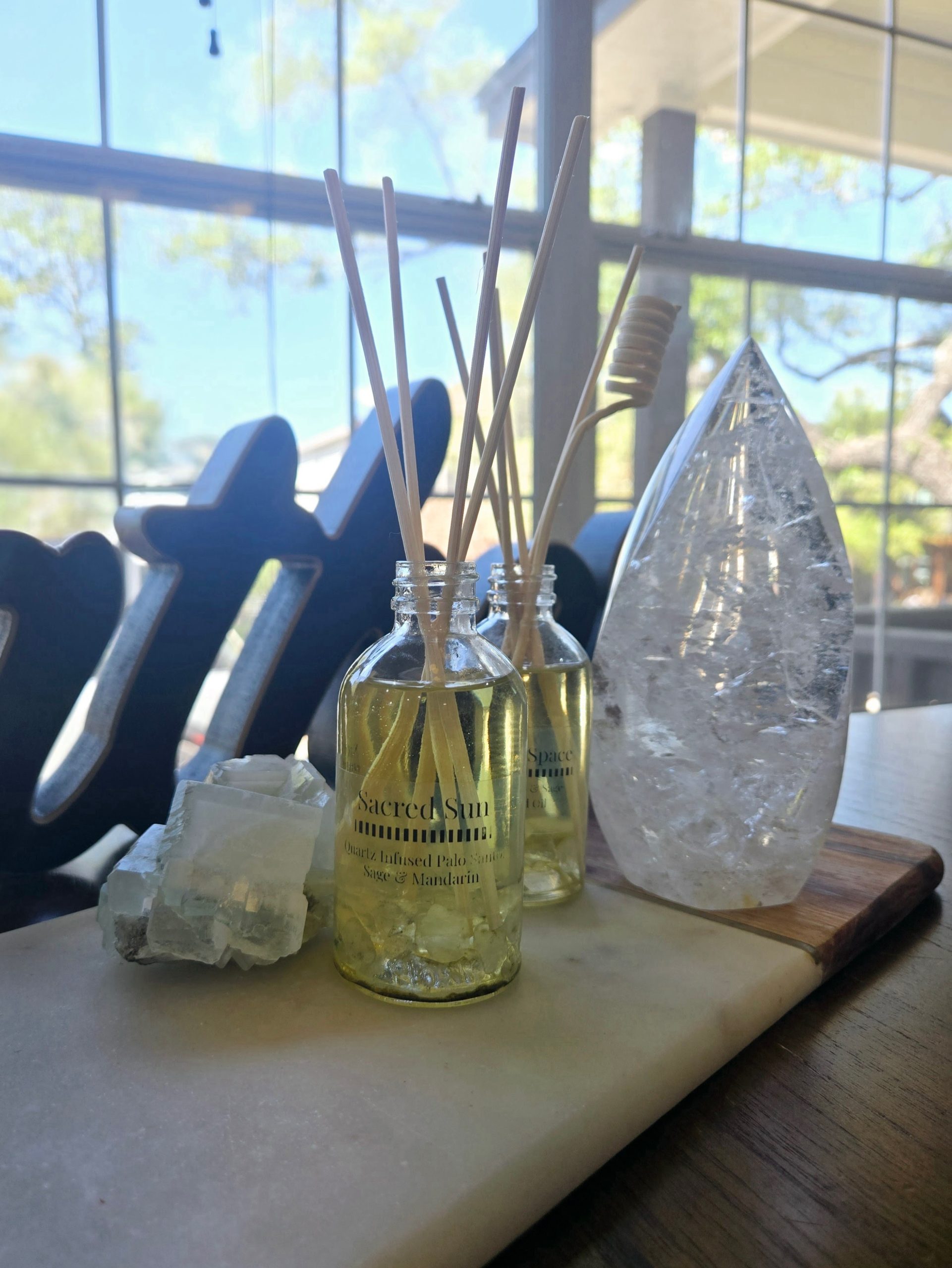 Let the scent of mandarin, palo santo, and sage cleanse any area where smoke or fire aren't permitted. Mandarin helps draw in love, while sage and palo santo cleanse and clear the space.
